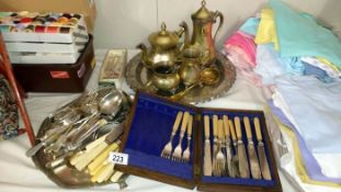 A large quantity of cutlery, silver plate etc