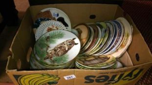 A box of collectors plates