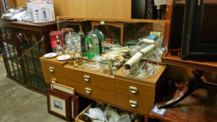 A mirrored sideboard with drawers