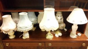 Approximately 10 table lamps