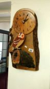 A wood effect clock featuring owl