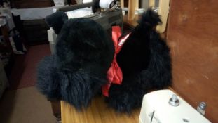 A large black West Highland terrier toy