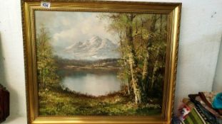 A oil on canvas Mountain lake scene