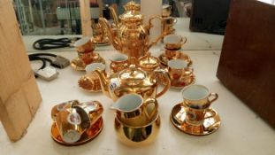 2 gilded tea sets