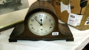 A oak mantle clock