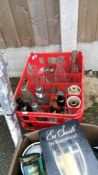 A crate of COD bottles etc