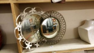 2 round mirrors
