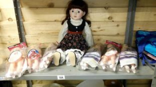 A quantity of porcelain dolls etc