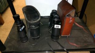 2 pairs of binoculars