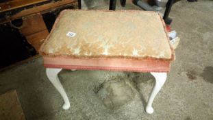 A dressing table stool