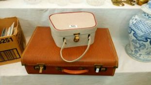 A small leather case & vintage beauty case