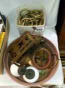 A quantity of curtain rail rings etc.