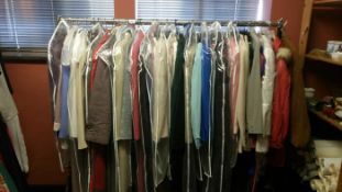 A rail of mainly good quality coats