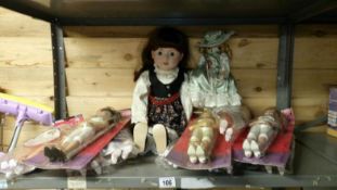 A shelf of dolls