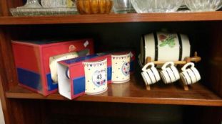 A spirit barrel with cup 'tots' & a Ringtons teapot etc.