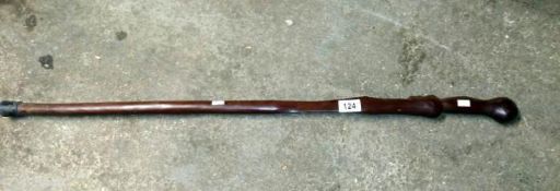 A carved walking stick