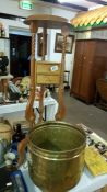 A mahogany 2 drawer pot stand & a large brass planter