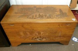 An Oriental carved blanket box