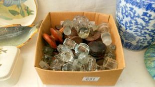 A quantity of bottle stoppers & door knobs