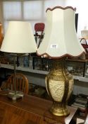 An ornate lamp & 1 other