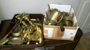 A quantity of brass including candlesticks