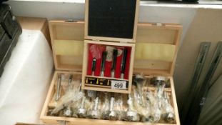 An 18 piece woodworking bit set & 1 other