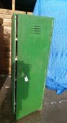 A green metal cupboard