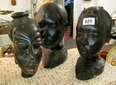 3 wooden tribal heads