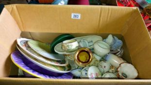 A box of miscellaneous china figures etc.