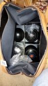 A bag containing lawn bowling balls