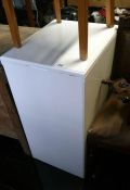 A white painted storage box