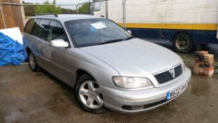 A silver 2000 Vauhall Omega estate car, 2198 CC, petrol, mileage 138,488, No MOT has been SORN