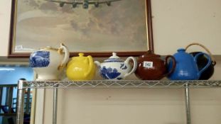 A quantity of teapots