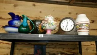 A mantel clock & miscellaneous pottery