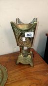 An Oriental brass stand