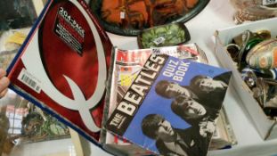 A book of NME Beatles magazines