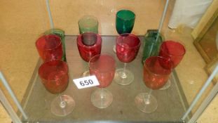 A quantity of Cranberry glasses & green glasses