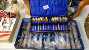 A cased set of spoons & cased set of cutlery