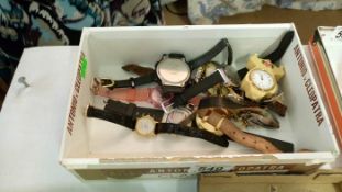 A box of assorted watches