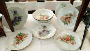 A quantity of decorative plates & vases