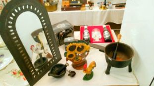 A quantity of cast iron items & a mirror