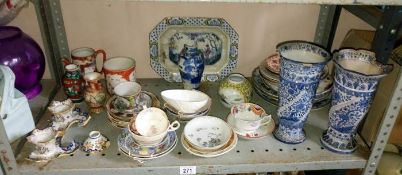 A shelf of old pottery & china A/F