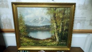 An oil on canvas lake scene