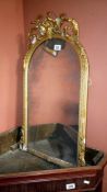 An old gilt framed orante mirror A/F