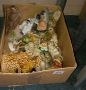 A box of miscellaneous china figures etc.