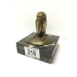 An unusual bronze of a bird on a marble base,