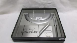 A genuine 1990's Lily Savage Blankety Blank cheque book and pen,
