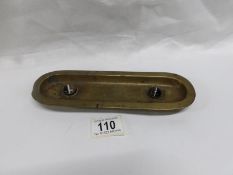 A Victorian brass pen tray with inset tigers eye stones