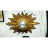 A sunburst wall clock