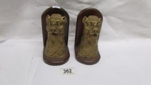 A pair of lion head book ends